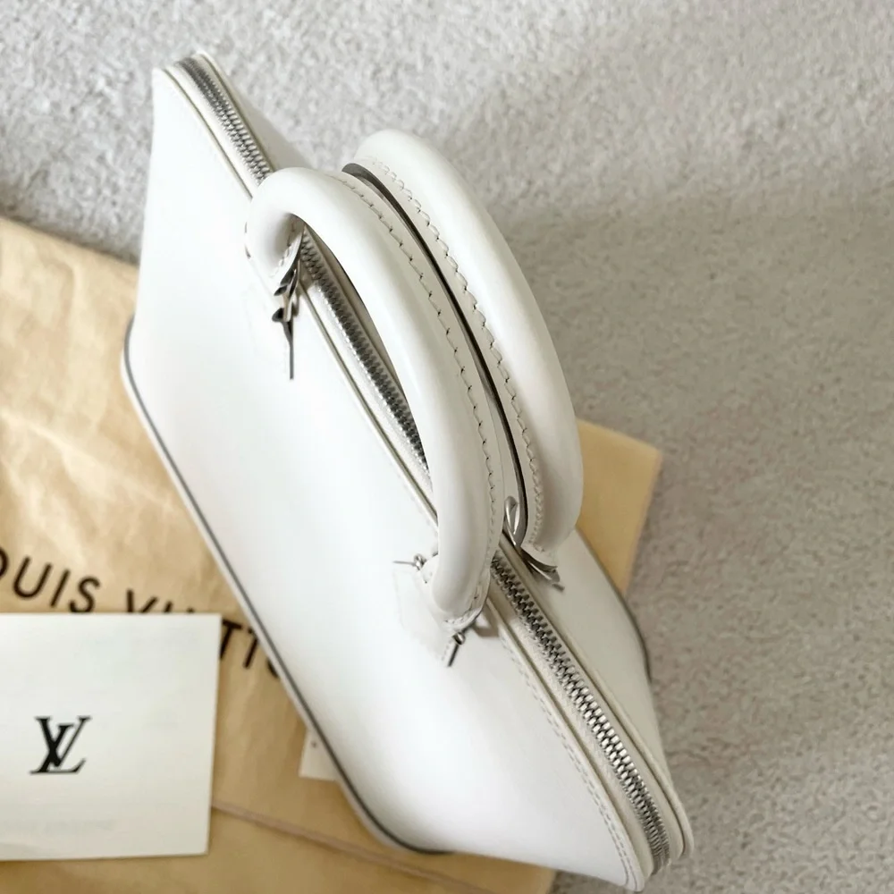 Authentic Louis Vuitton ivory EPI Alma PM bag
